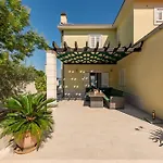 Tatijana Zadarvillas *